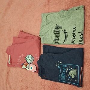 Lots of 3 girls t-shirts.